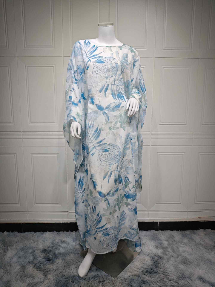 Modest floral chiffon dress with elegant loose fit and wide sleeves in soft, serene colors.