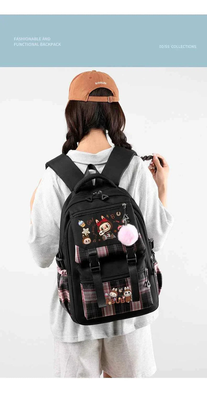 Cute LABUBU backpack with large capacity, cartoon design, black with plaid accents and pink pompom accessory, ideal for school and daily use