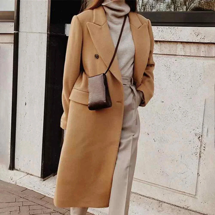 classic winter coat with double-breasted buttons in beige worn with turtleneck and trousers