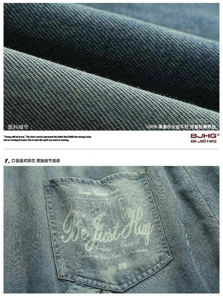 close-up of faded denim fabric and back pocket detail with printed logo on wide street style jeans