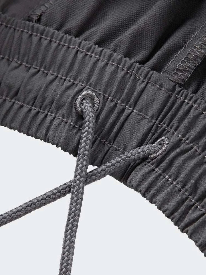 تفصيل حزام مطاطي بسحب ورباط في Adidas بنطال رياضي قابل للفصل باللون الرمادي