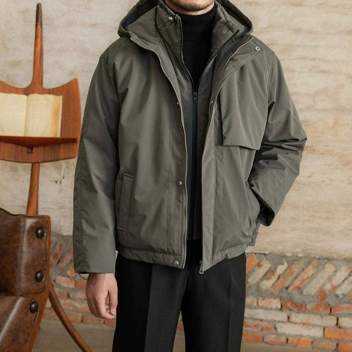 Mr. Lu San's windproof jacket in dark olive with hood and double zipper design for warmth and style