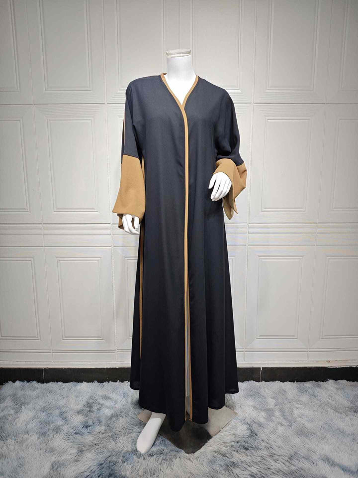 Elegant black abaya with colored sleeve accents and trim, made of light polyester.