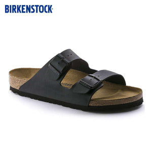 BIRKENSTOCK  Arizona double-buckle slippers.