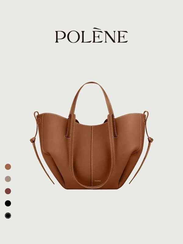 Polène Cyme Mini brown leather tote bag with soft curves and dual strap design.