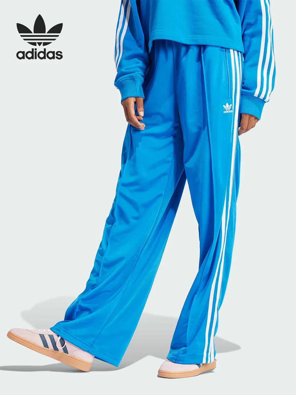 أديداس Blue Adidas original sports pants with white three stripes and soft comfortable fabric for daily wear and workouts