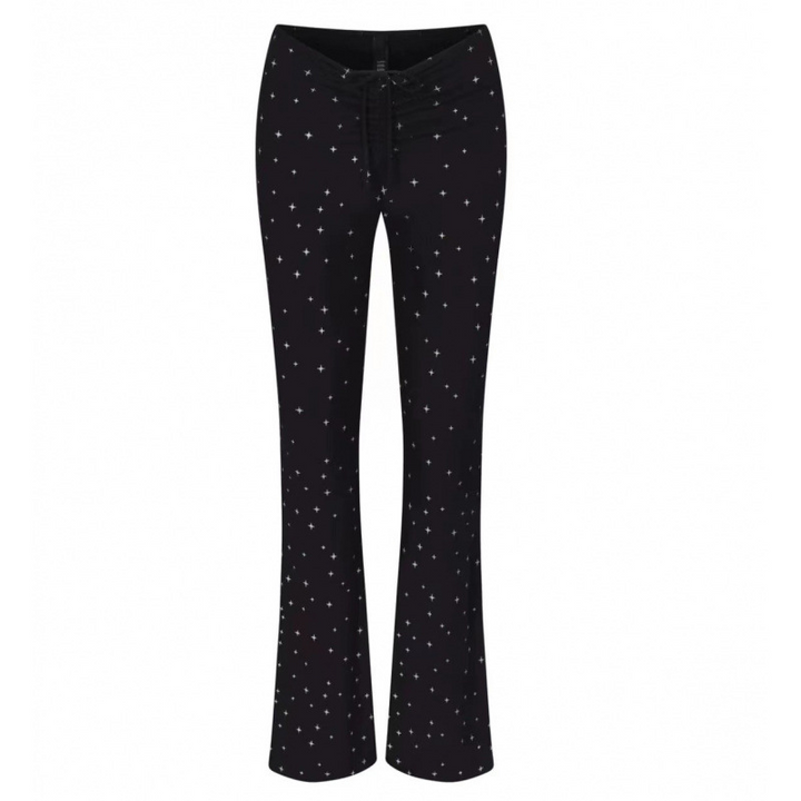 SKIMS wide-leg lounge pants with adjustable drawstring waist in black with small white star pattern