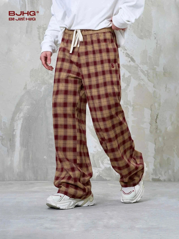 Wide brown checkered pants with comfortable loose fit and casual style