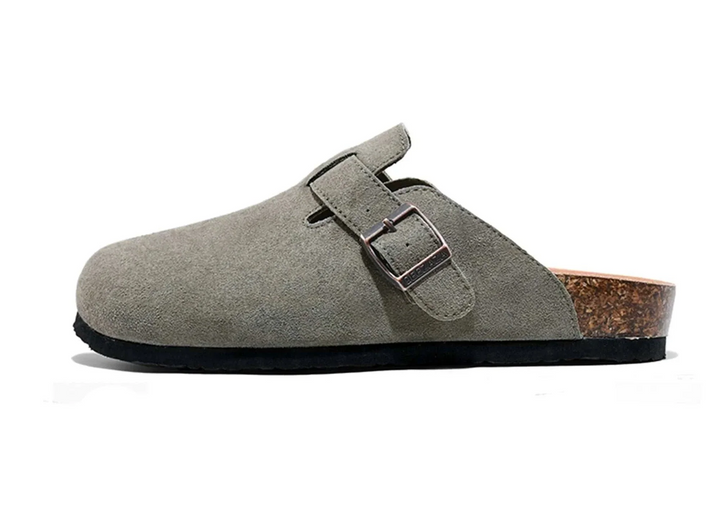 حذاء Birknstok بتصميم clog جلدي سويدي بنعل سميك وبابزيم معدني لمظهر عصري وكلاسيكي