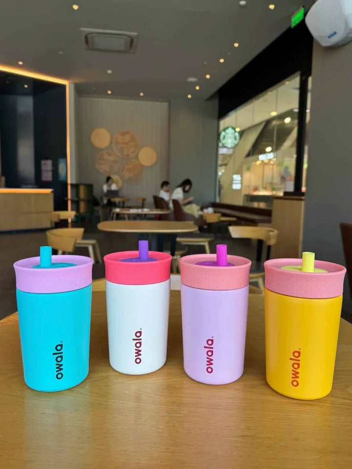 Set of colorful insulated Owala FreeSip bottles with integrated straws, ideal for all ages and everyday use.