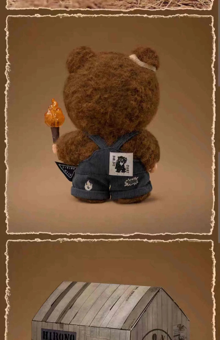 POPMART Hirono Living Wild plush bear doll in dark brown fur holding a flame torch, wearing detailed black embroidered clothing, standing 16 cm tall