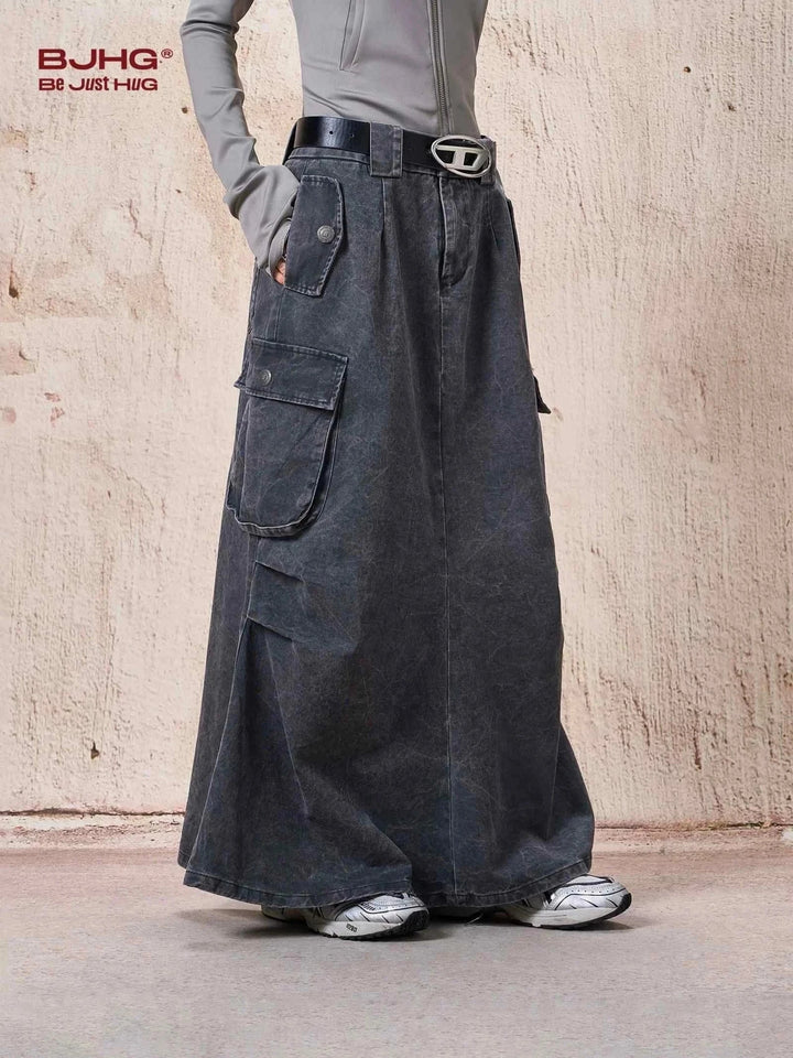 long black cargo denim skirt with side pockets and belt loop styling