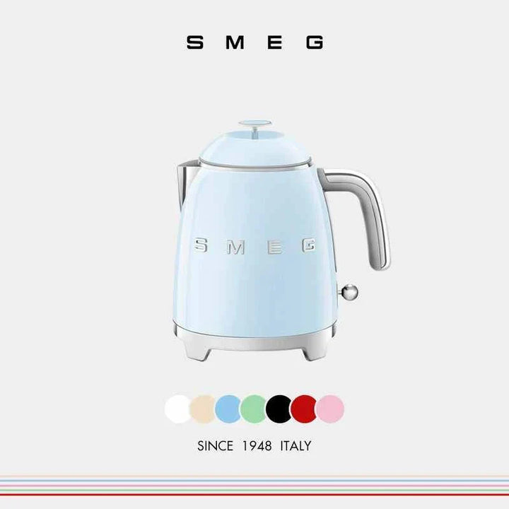 SMEG small electric kettle 0.8L Italian design with pastel blue color, stainless steel handle, and V-shape spout for smooth pouring.