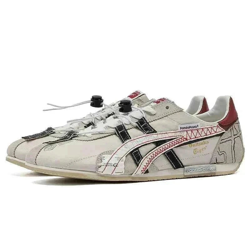 حذاء رياضي Onitsuka Tiger PandaPrank بتصميم عصري أبيض وأسود.