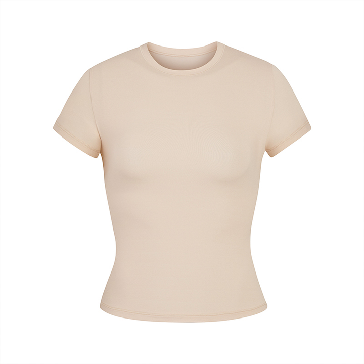 Skims short sleeve slimming crew neck t-shirt in sand color with soft stretch fabric and slim fit design