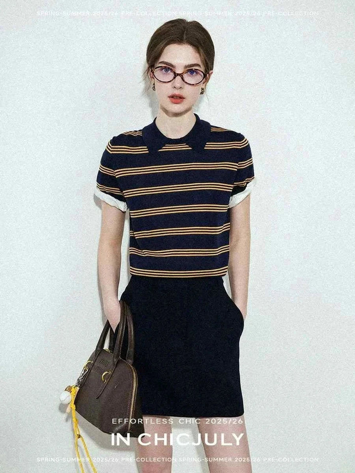 Elegant CHICJULY casual outfit with navy and yellow striped polo shirt and black skirt for spring and summer 2025/26.