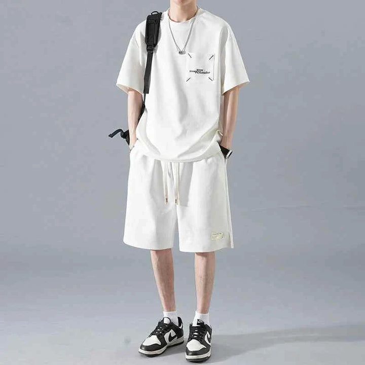 Men's Ice Silk set with loose white t-shirt featuring front pocket and matching comfortable shorts with adjustable drawstring.