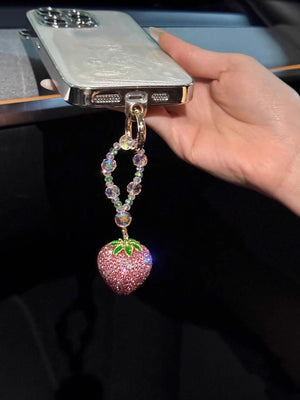 تعليقة هاتف Phone Charm بتصميم فراولة مرصعة بالكريستال.
