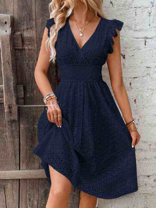 Elegant plus-size V-neck dress with ruffle sleeves in a stylish cut-out design for women.