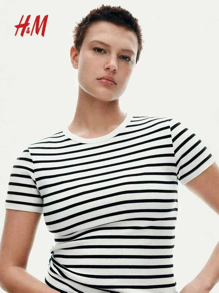 Ribbed jersey T-shirt with black and white stripes from H&M.اتش اند ام