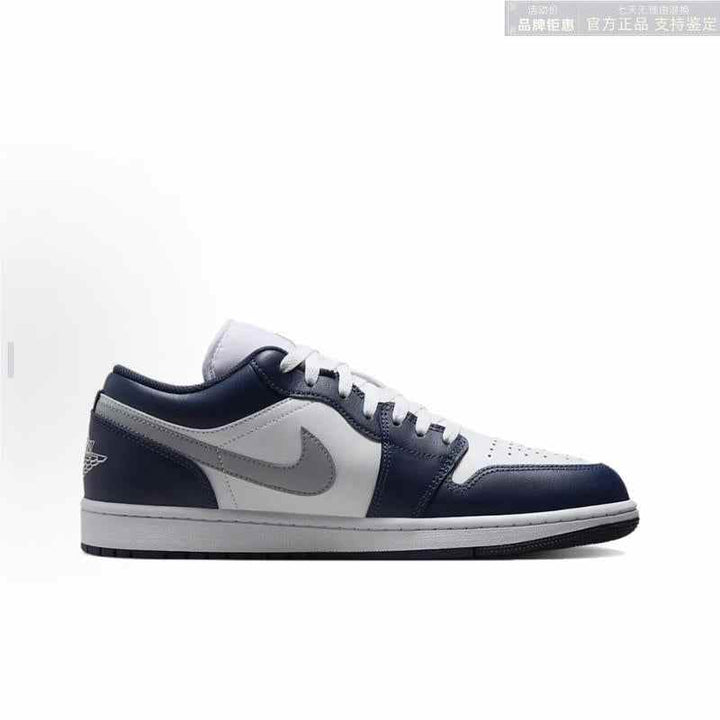 Air Jordan 1 Low sneaker in white, midnight navy, and wolf grey colors.