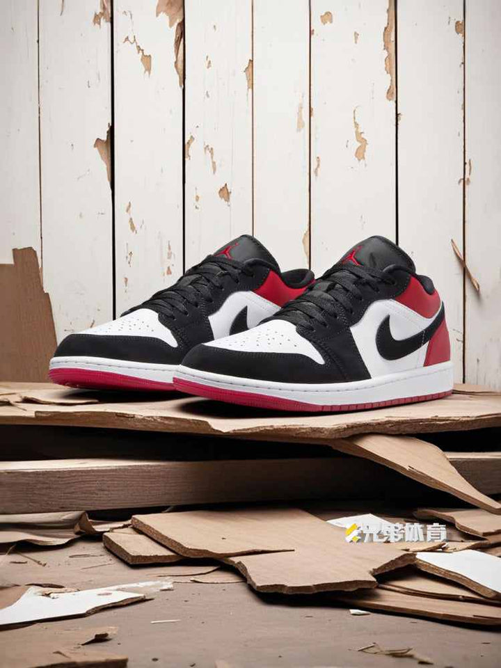 Air Jordan 1 Low sneakers in white, varsity red, and black on rustic wood background.