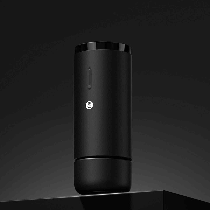 Portable black TIMEMORE WHIRLY 01S electric coffee grinder with stainless steel blades and USB-C charging.