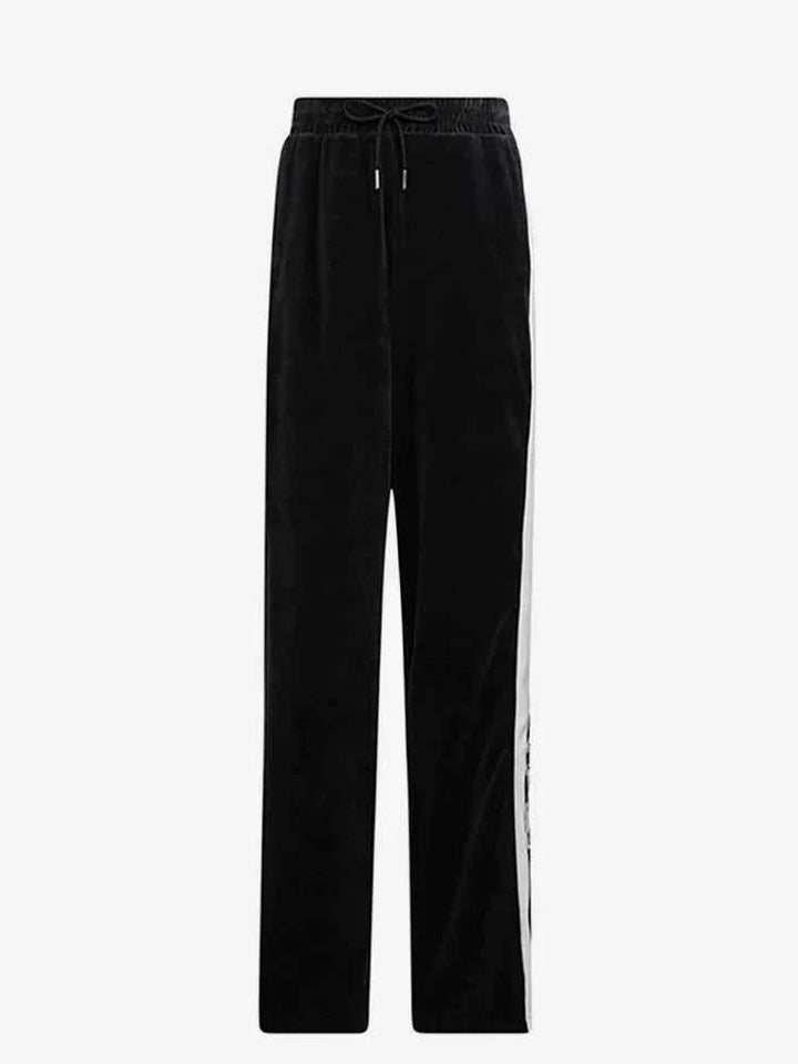 Black Adidas sports pants with classic design and white side stripes