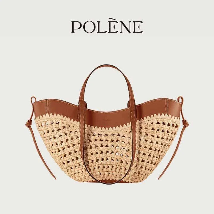 Polène Cyme woven raffia bag with cowhide leather details and adjustable shoulder strap.