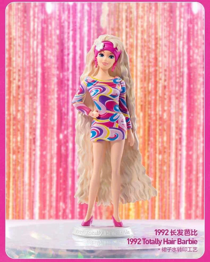 1992 Totally Hair Barbie from Barbie Fashion Series with long hair and colorful dress against shiny backdrop.