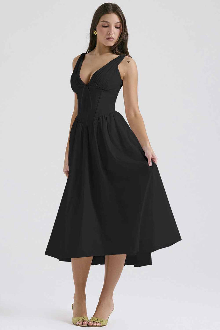 European and American style long black slip dress with V-neck for summer fashion.