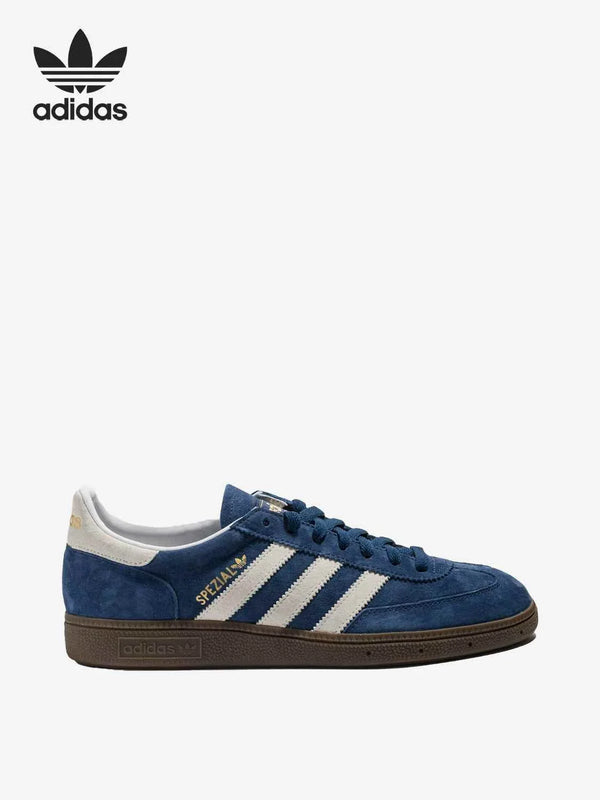 Adidas Spezial Clover low-top sneakers in navy blue with white stripes and brown sole