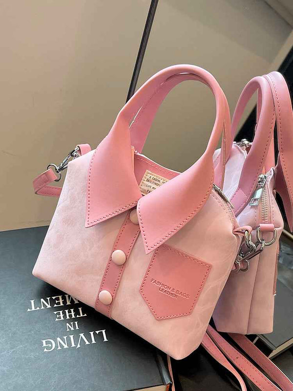 Korean niche design pink handbag with shirt-inspired details and crossbody strap.
