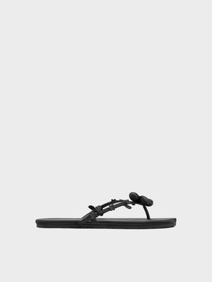 CHARLES&KEITH بمظهر أنثوي حذاء صيفي زهري و أسود مريح وأنيق بقصة مسطحة.