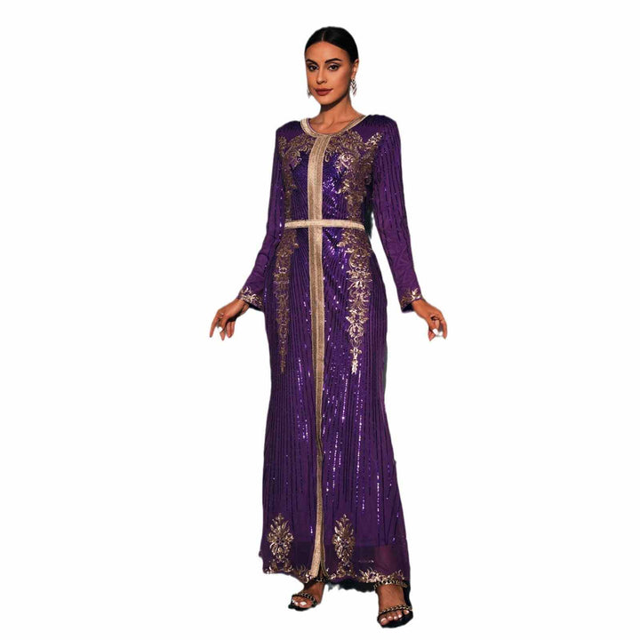 Luxury Moroccan caftan in deep purple with elegant gold embroidery and shimmering fabric, featuring a slim gold belt and decorative details, ideal for special occasions and lavish events.