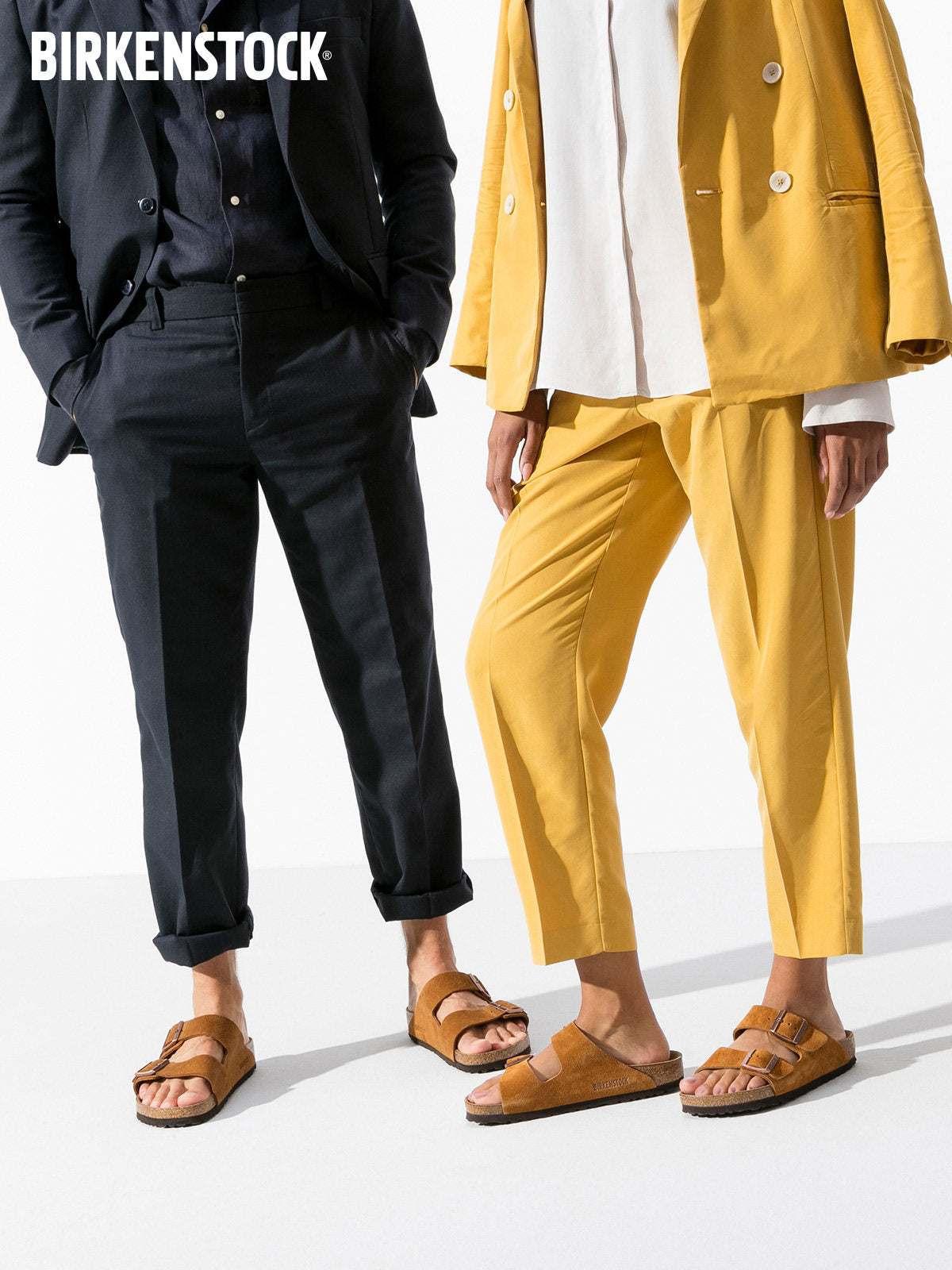 BIRKENSTOCK  Arizona double-buckle slippers.