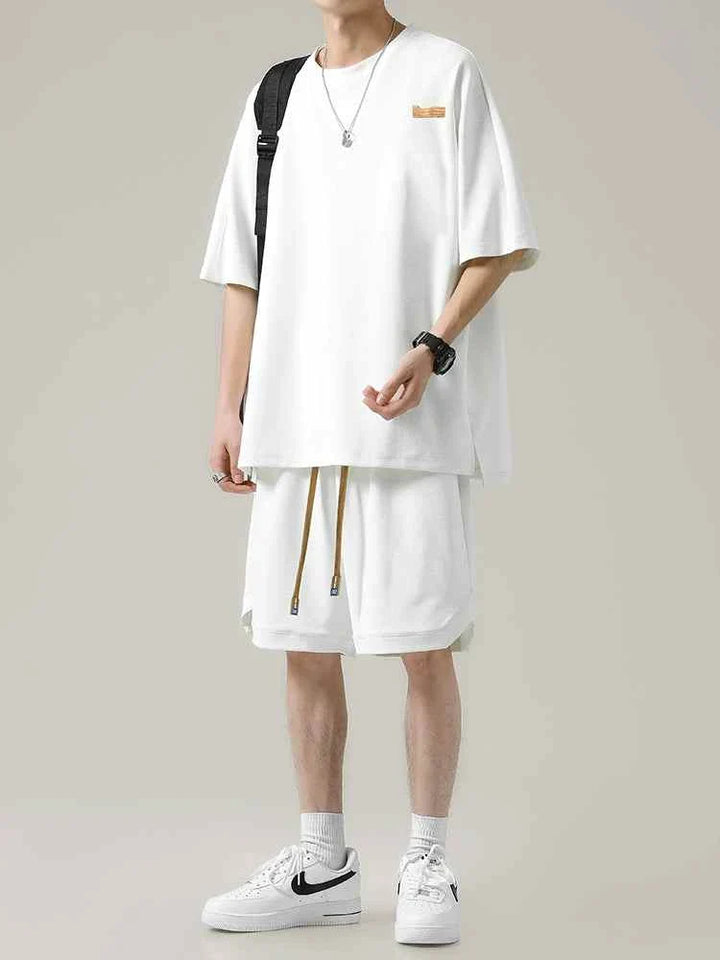 Men's Ice Silk set with loose white t-shirt and practical shorts, breathable and wrinkle-resistant fabric for summer comfort