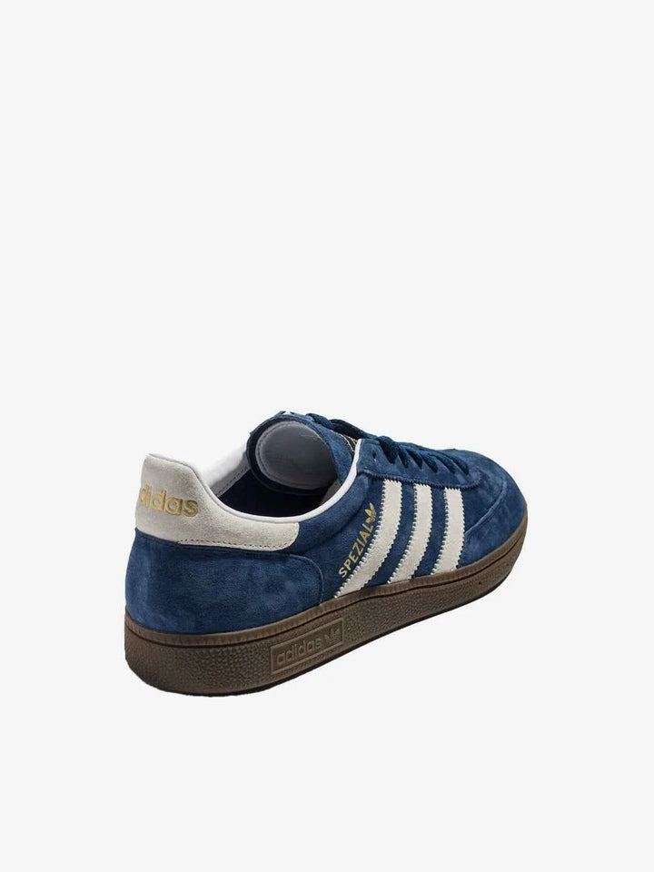 Adidas Spezial Clover navy blue low-top sneakers with white stripes and brown sole