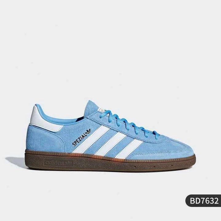 Blue Adidas Spezial Clover low-top sneaker with white stripes and brown sole