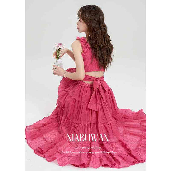 Women's summer seaside resort-style suspender dress with tiered skirt.