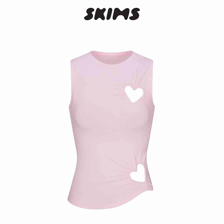 Pink SKIMS Kardashian women's sleeveless top with heart-shaped cutouts on chest and waist
