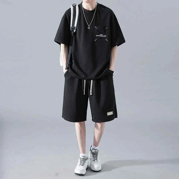 Men's black Ice Silk loose fit t-shirt with front pocket and matching shorts, casual summer outfit with adjustable waistband.