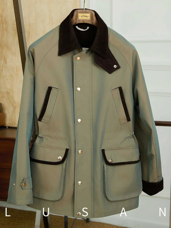 Mr. Lu San British Gabardian olive gabardine jacket with dark brown corduroy collar and pockets, rain-resistant, adjustable cuffs, and buttoned front.