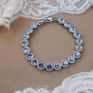 سوار نسائي مرصع بـ Zirconia بحواف كريستالية فاخرة ومختلف الألوان.