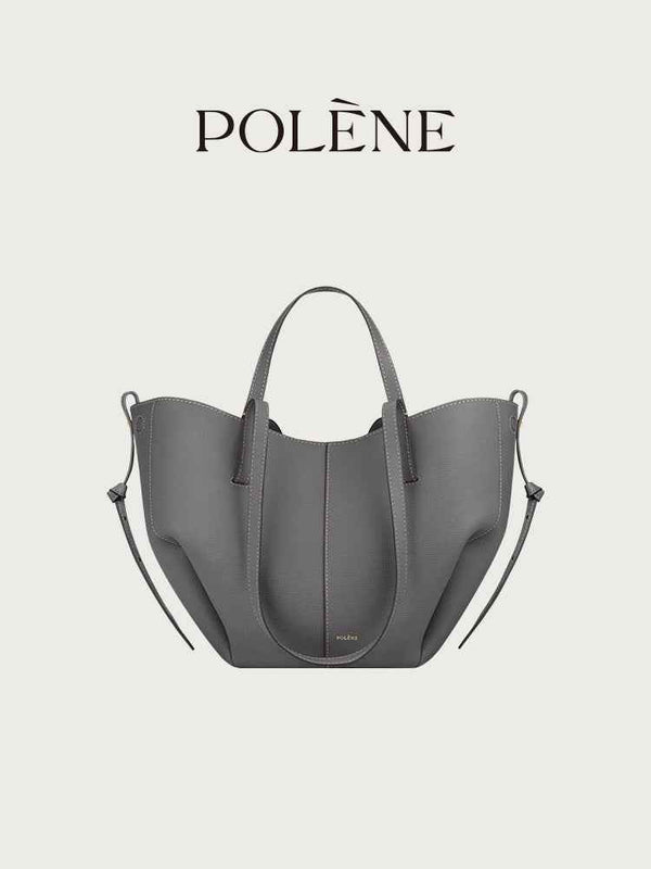 Polène Cyme Mini small gray leather tote bag with soft curves and dual open or closed design.