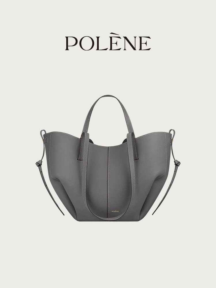 Polène Cyme Mini small gray leather tote bag with soft curves and dual open or closed design.