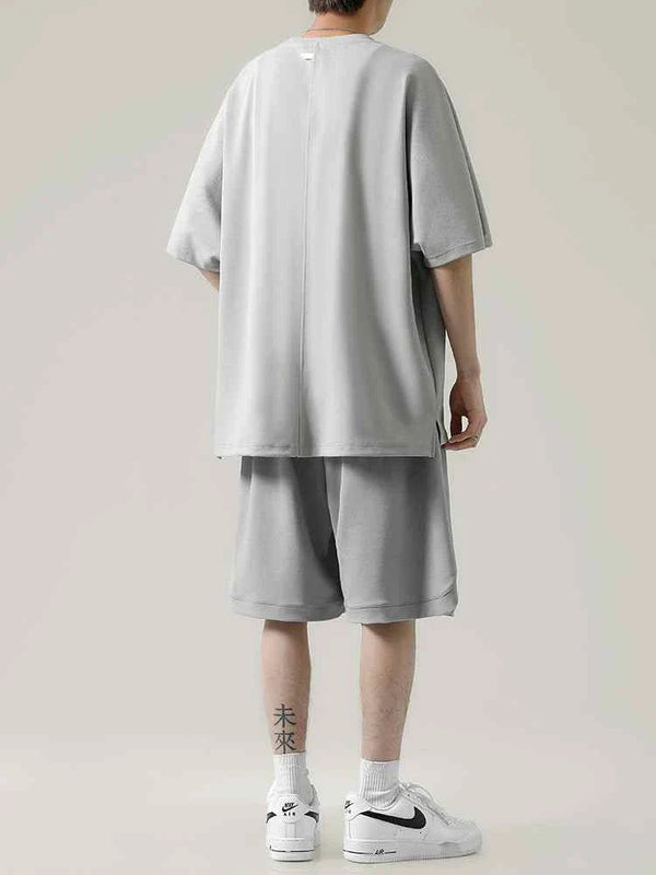 Men's Ice Silk set with loose T-shirt and practical shorts in light gray color