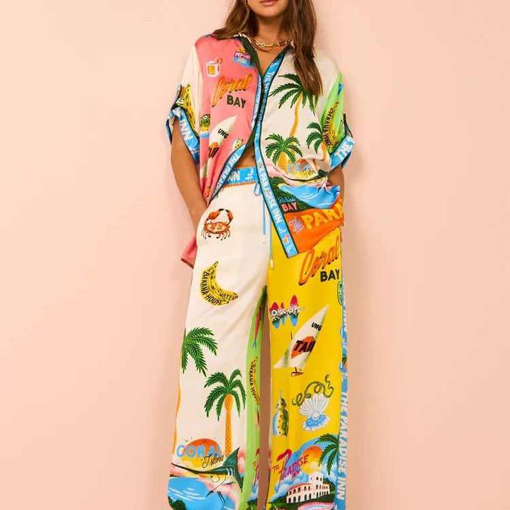 Fashionable European and American resort-style color-blocked tether set with vibrant print and short sleeves.
