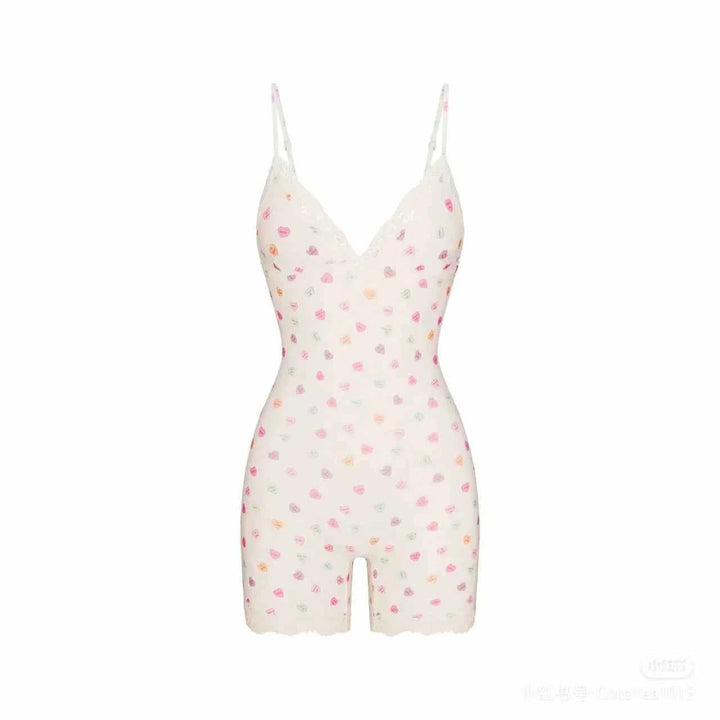 white lace bodysuit with soft heart prints and adjustable straps, comfortable stretchy fabric