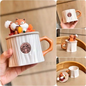 مج Starbucks بتصاميم كرتونية لطيفة وغطاء مميز.